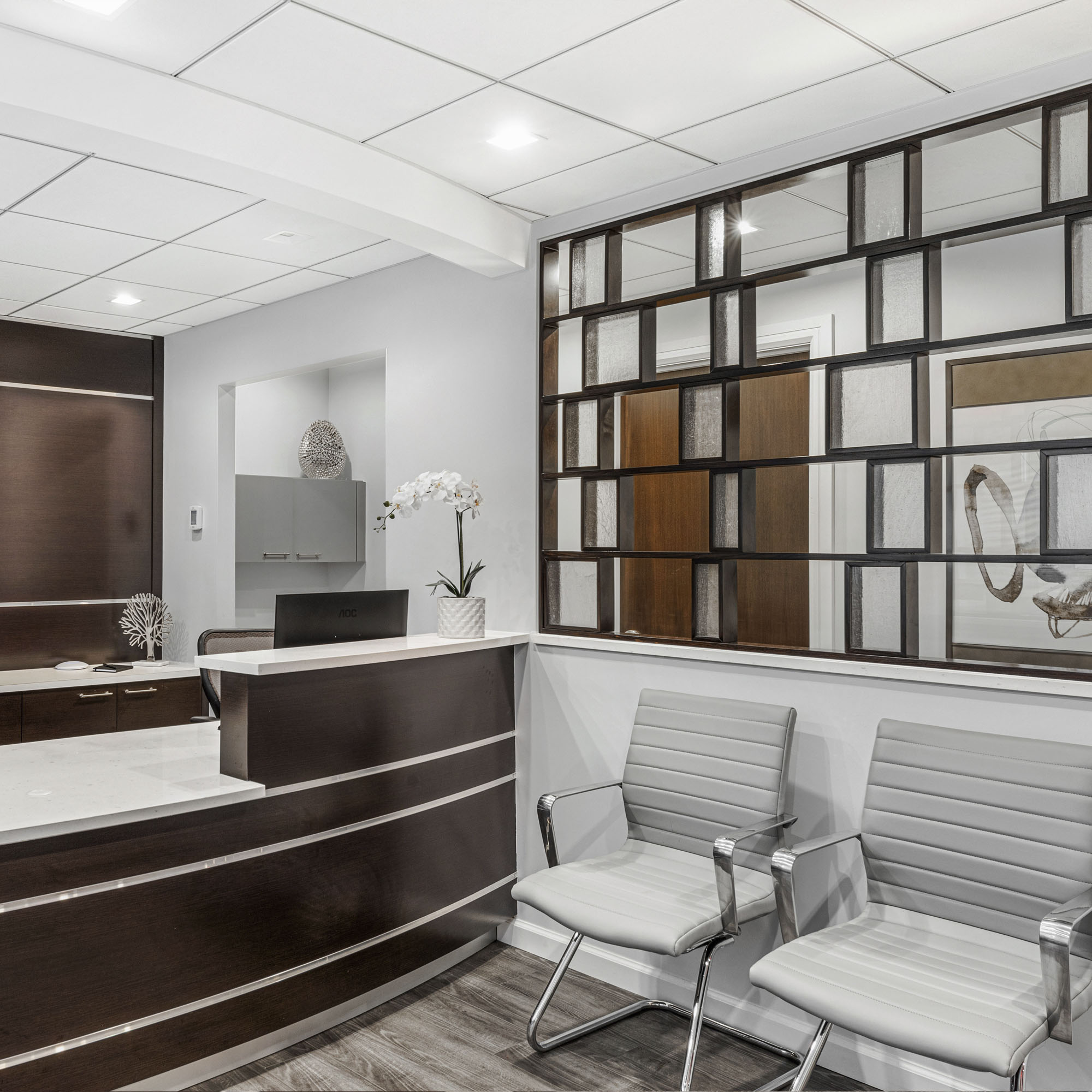 medical office design with reception desk and accent wall