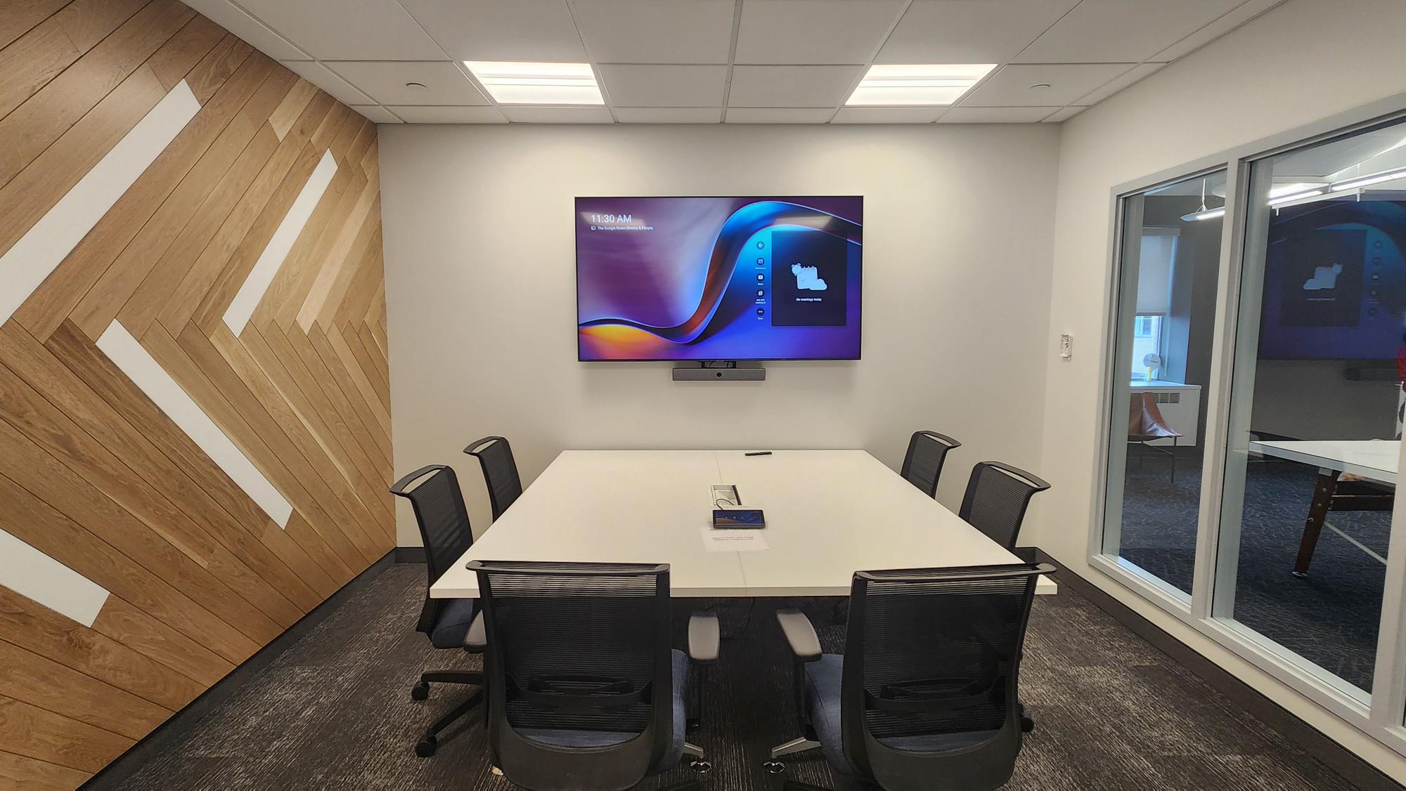 Private office with window, desk & chairs, table & chairs