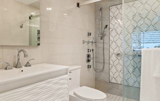 View of high-end contemporary condo spa-like primary bathroom ensuite