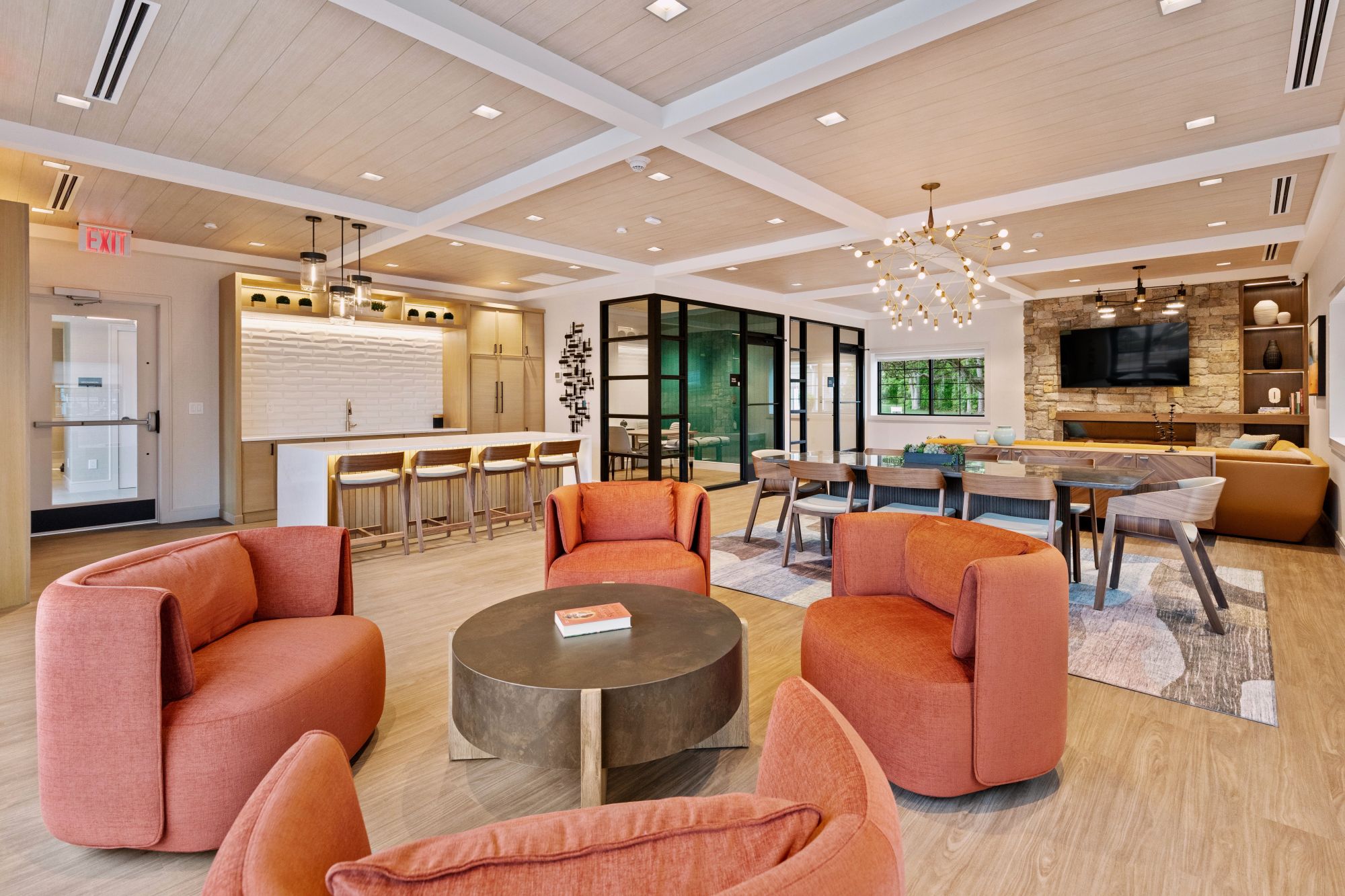 Condo Amenity lounge design Private office with window, desk & chairs, table & chairs